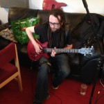 Matt Oastler playing guitar for Mind your PMQs